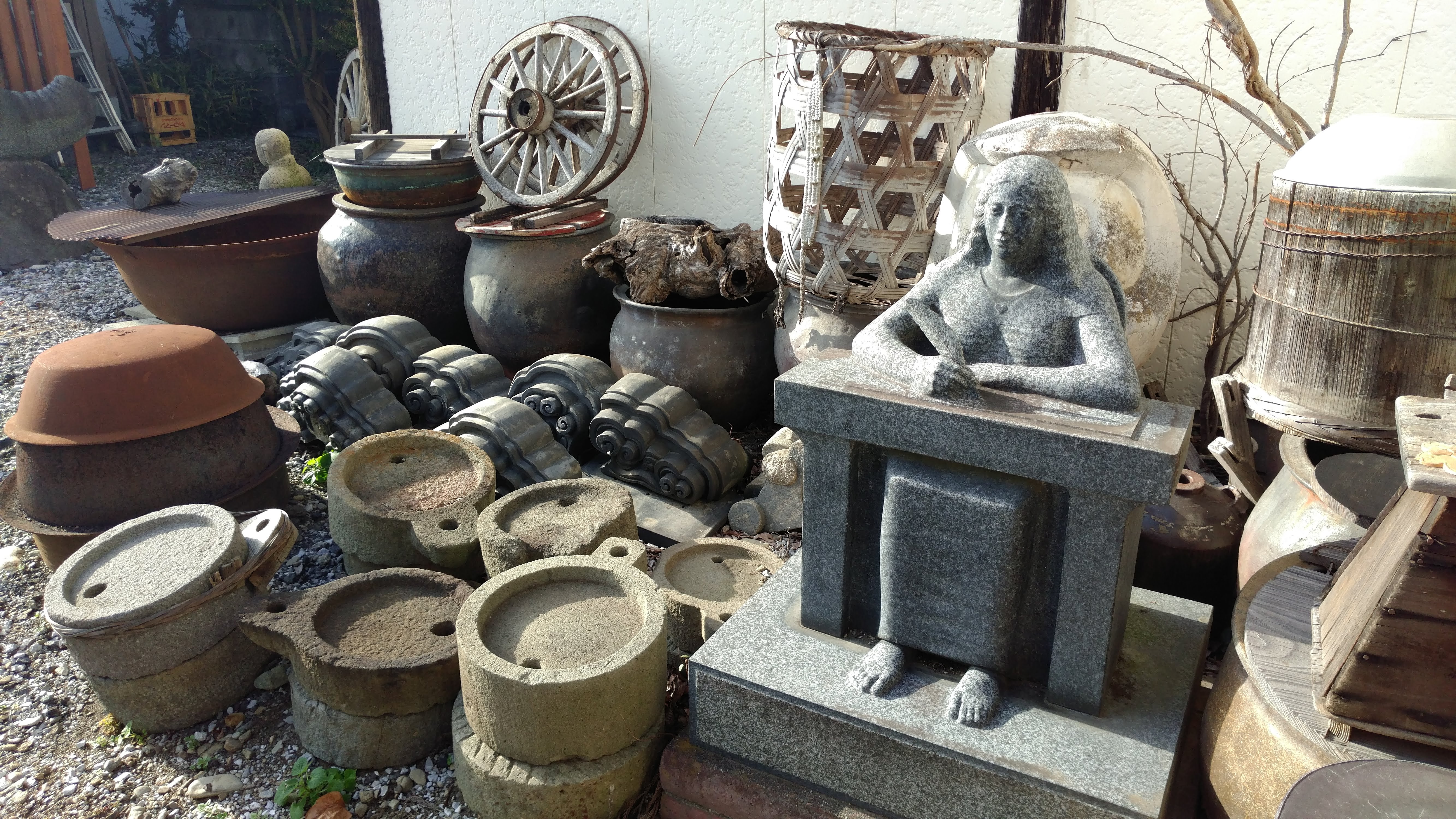 various ceramic pots and decorative items