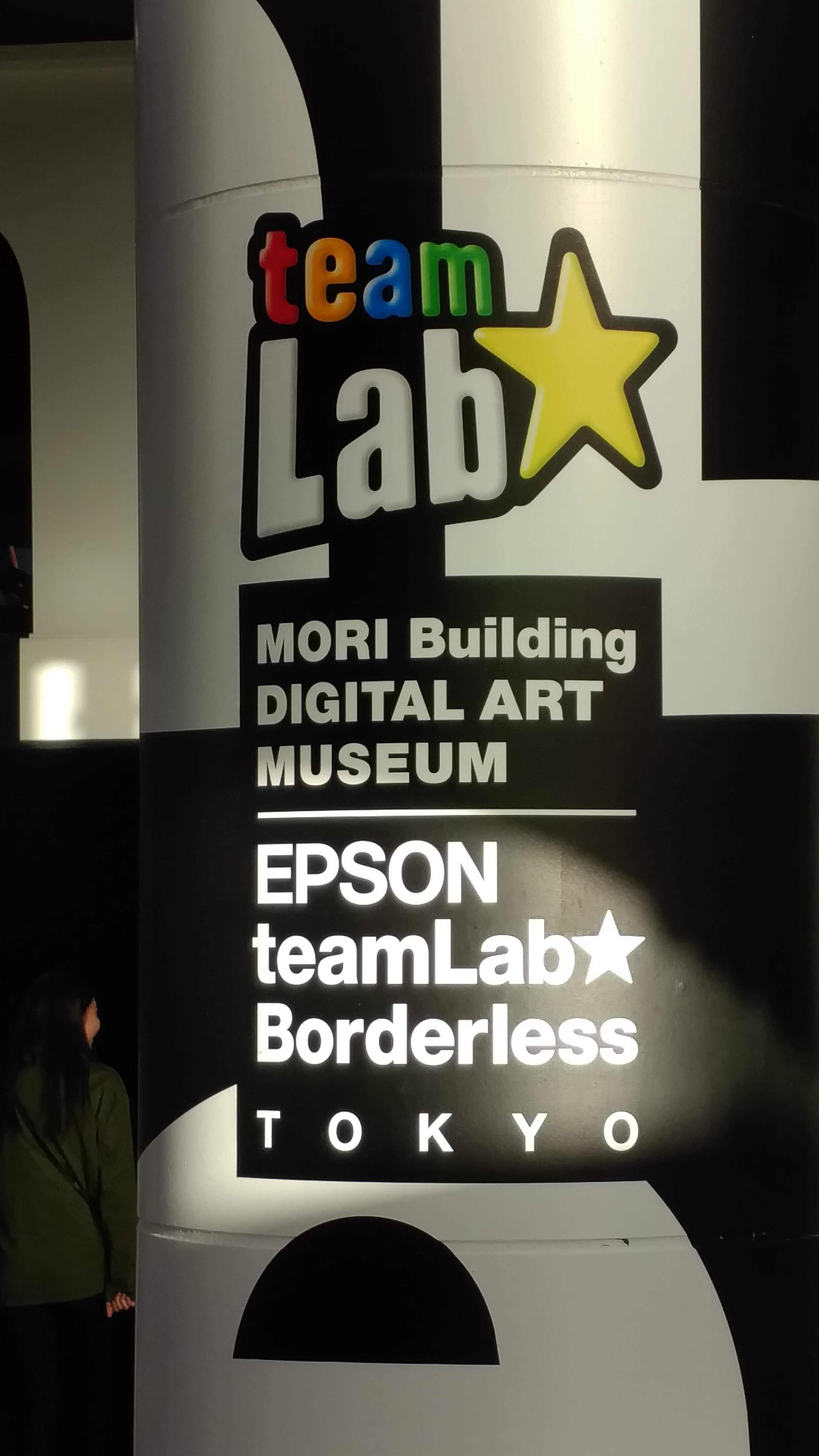 sign with teamlab logo, Mori Building Digital Art Museum, and epson teamlab borderless tokyo