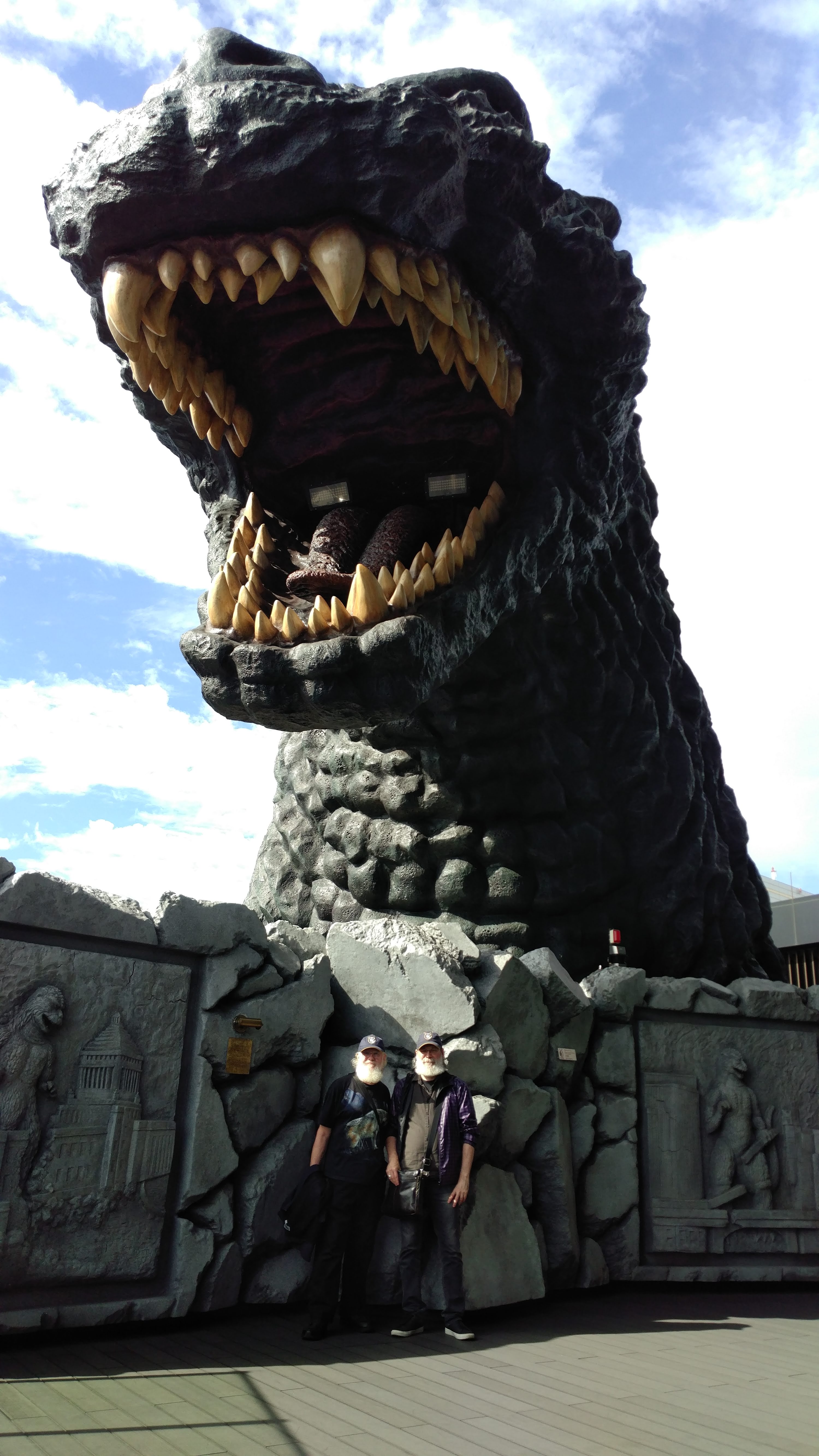chris and earl with godzilla's head