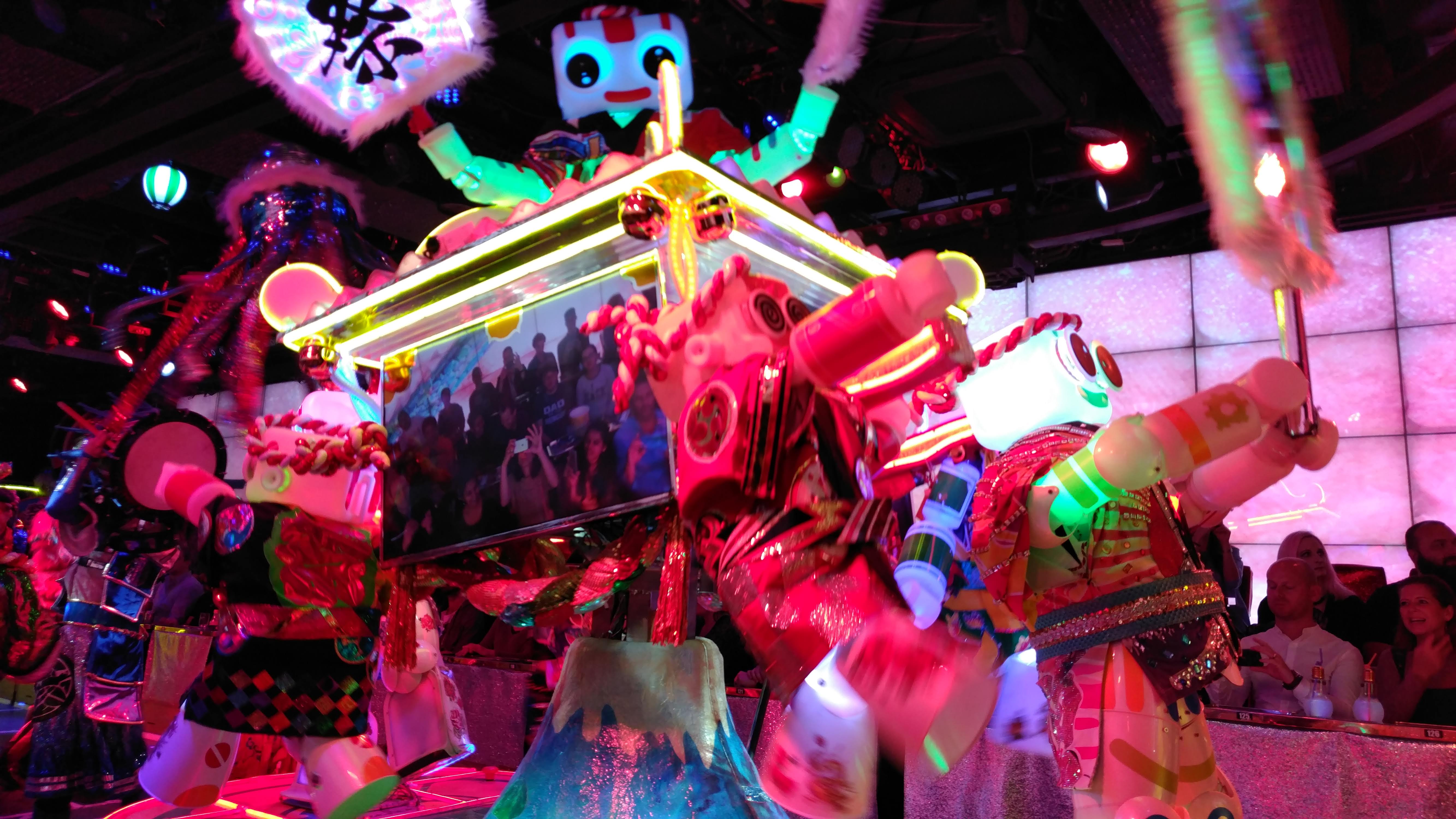 a float with robots and many coloured lights