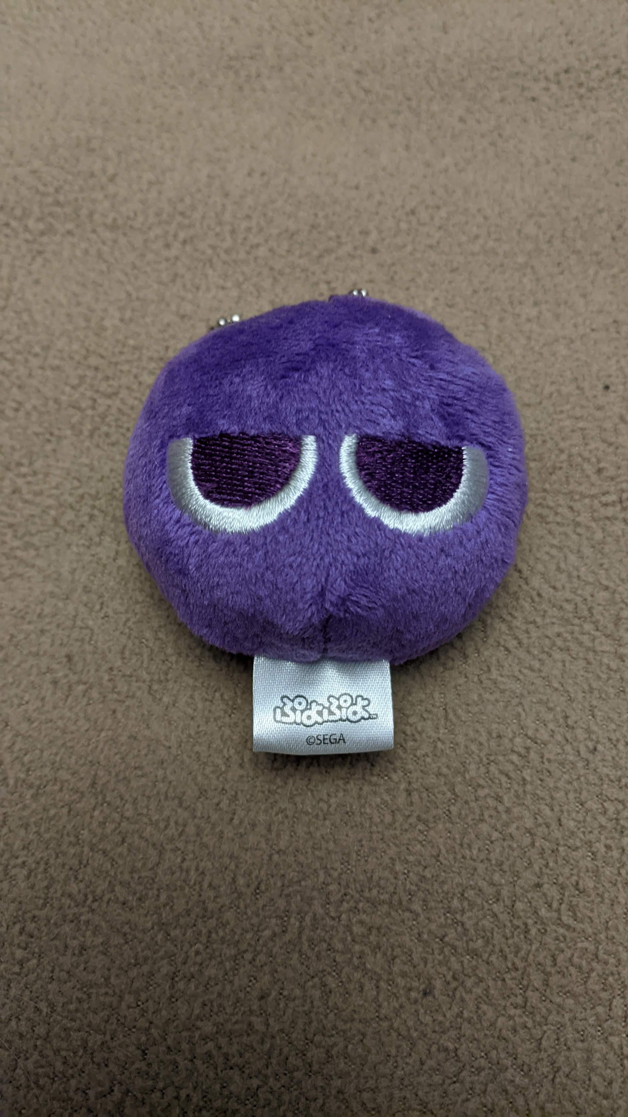 a purple puyo game character