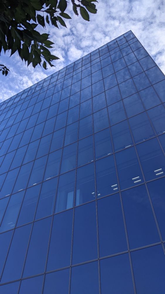 Looking up at the glassed office floors above