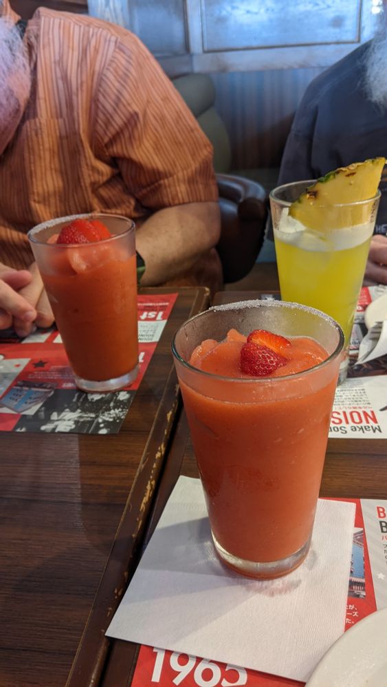 Two Strawberry Daquiris and a Pina Colada